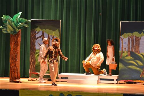 The Tin Man, the Scarecrow, the Lion, and Dorothy together. 