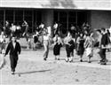 Students exiting the building in the 50s 