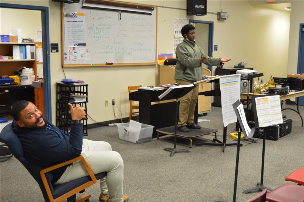 Mr. White and his student conductor. 